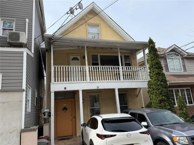 Welcome to this well-maintained 2-family home in Staten Island - photo 3