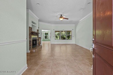 A welcoming three-bedroom, two-bath vinyl-sided home combines - photo 6