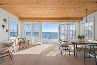 Welcome to 613 Commercial Street, a striking waterfront home in - photo 2