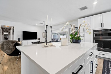 Beautifully updated 4/2 pool home in North Palm Beach. New metal - photo 5