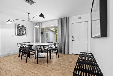 Beautifully updated 4/2 pool home in North Palm Beach. New metal - photo 7