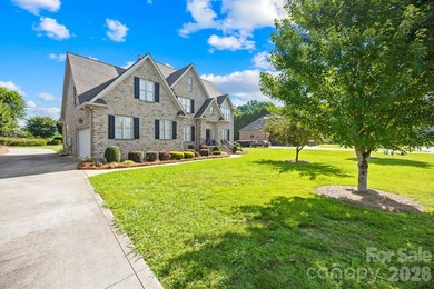 Welcome home to this stunning, all-brick custom-built residence - photo 3