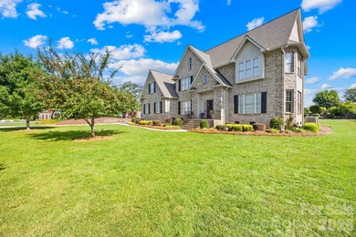 Welcome home to this stunning, all-brick custom-built residence - photo 4
