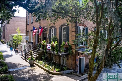 This classic Savannah gray brick townhome, located in the heart - photo 2