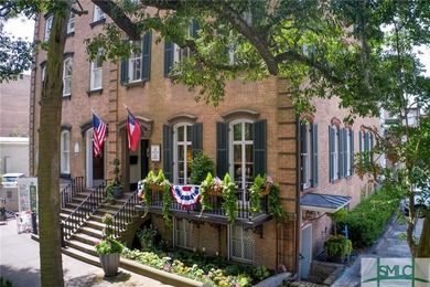 This classic Savannah gray brick townhome, located in the heart - photo 3
