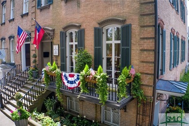 This classic Savannah gray brick townhome, located in the heart - photo 4