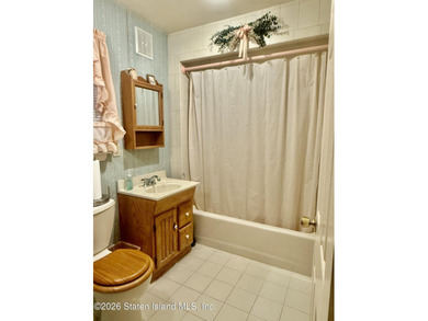 WELL MAINTAINED ONE FAMILY HOME FEATURING A DESIRABLE FIRST - photo 9