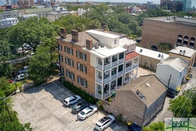 This classic Savannah gray brick townhome, located in the heart - photo 10