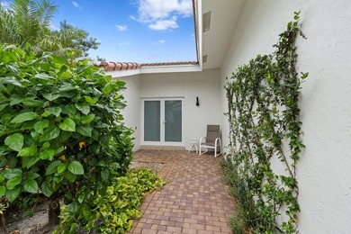 Welcome home to the highly desirable gated community of the - photo 3