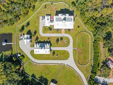 Tucked behind a private gated entrance just north of Tampa and - photo 6