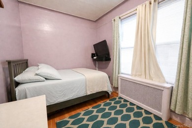MOVE RIGHT INTO THIS WELL MAINTAINED 2 FAMILY SEMI-ATTACHED HOME - photo 12