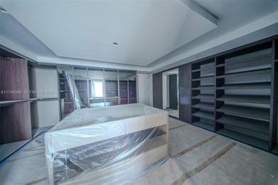 Set on a coveted point lot in the exclusive Harbor Beach enclave