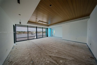 Set on a coveted point lot in the exclusive Harbor Beach enclave