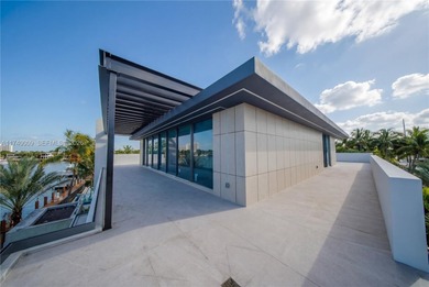 Set on a coveted point lot in the exclusive Harbor Beach enclave