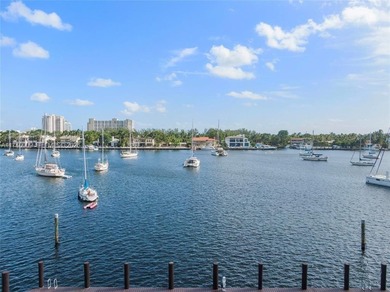 Set on a coveted point lot in the exclusive Harbor Beach enclave