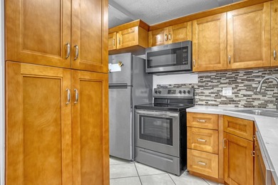 Beautifully upgraded corner unit with stunning lake views from - photo 11