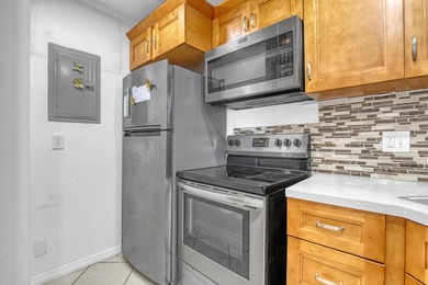 Beautifully upgraded corner unit with stunning lake views from - photo 12