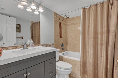 Beautifully upgraded corner unit with stunning lake views from - photo 21