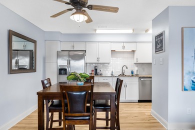 Gorgeous ground level 2 bedroom condo with NEW FLOORING and a - photo 9