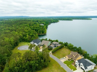 Vacant level lot in the gated and very private Wisdom Pointe - photo 2