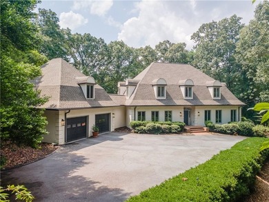 Welcome to your dream home overlooking the lake & pristine - photo 1