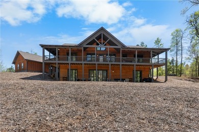 Rustic elegance meets luxury in this exceptional 2022 Lake - photo 1