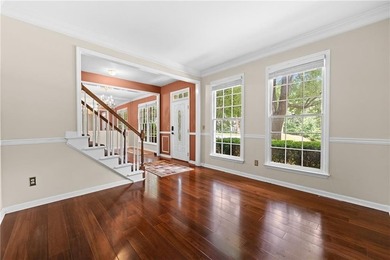 Welcome home to this beautifully maintained brick-front - photo 8