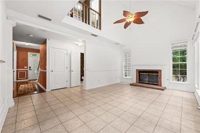 Welcome home to this beautifully maintained brick-front - photo 10