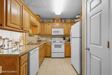 End Unit with Ceramic tile flooring flows throughout the home - photo 8