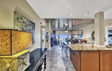 This spacious, 10th floor, open layout is one of the best on the - photo 2