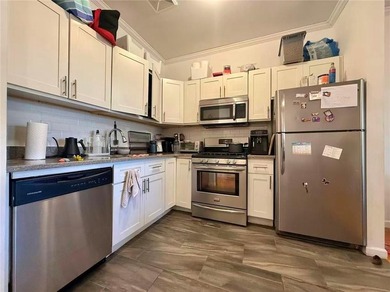 Well-maintained 3-family property featuring a one-store - photo 7