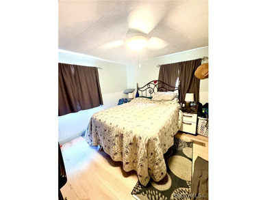 Check out this great double wide mobile on a 1.05 acre lot. It - photo 12