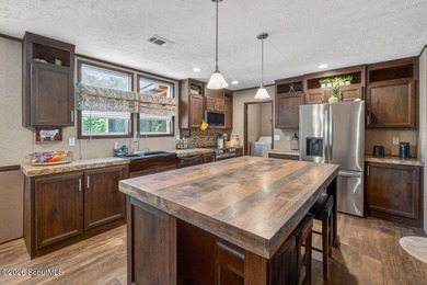 Step into this beautiful home and immediately be welcomed by a - photo 7