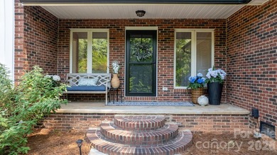 Timeless Southern charm meets golf course living in this - photo 8