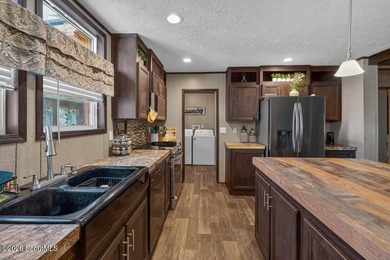 Step into this beautiful home and immediately be welcomed by a - photo 8