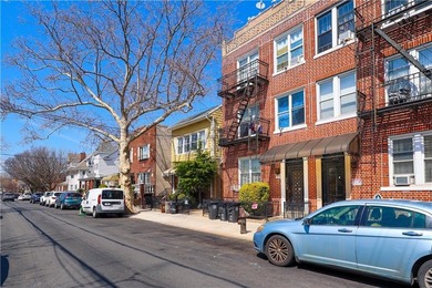 Introducing this solid all-brick, three-story 6-family building - photo 4