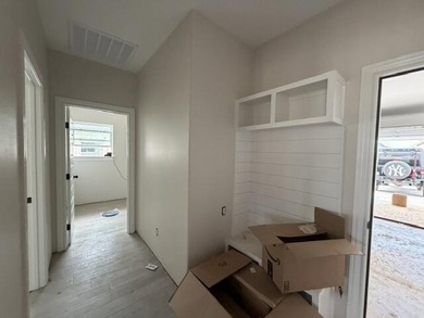 Another stunning creation by Deluxe Custom Homes! This 4-bedroom - photo 8