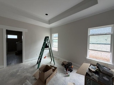 Another stunning creation by Deluxe Custom Homes! This 4-bedroom - photo 10