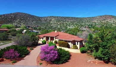 This custom-built residence at 144 Sun Up Ranch Rd is a