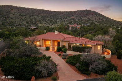 This custom-built residence at 144 Sun Up Ranch Rd is a