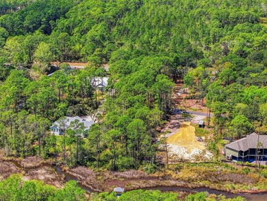 This beautiful waterfront homesite is tucked away in the - photo 5