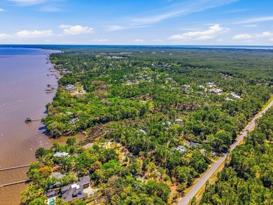 This beautiful waterfront homesite is tucked away in the - photo 7