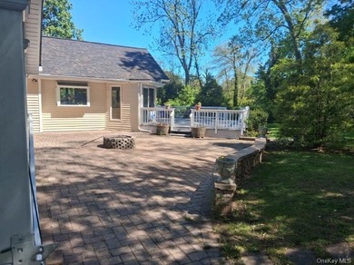 Discover Your Dream Home in Amityville!  Step into this stunning - photo 4