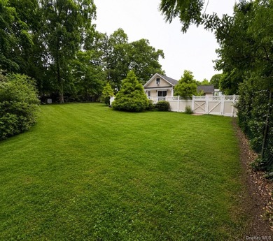 Discover Your Dream Home in Amityville!  Step into this stunning - photo 7