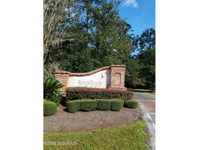 Nice pond front lot in River Place Plantation. Walk to the - photo 1