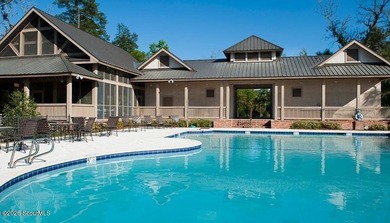 Nice pond front lot in River Place Plantation. Walk to the - photo 3