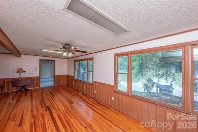 Welcome to this 4-bedroom, 3-bathroom waterfront retreat on the - photo 11