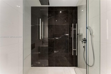 Experience refined waterfront living in the iconic Aston Martin