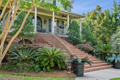 Nestled on a picturesque tree-lined street, this expansive home