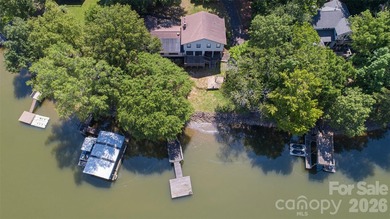 Welcome to this 4-bedroom, 3-bathroom waterfront retreat on the - photo 35